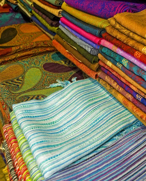 Fabrics on a market stall — Stock Photo, Image