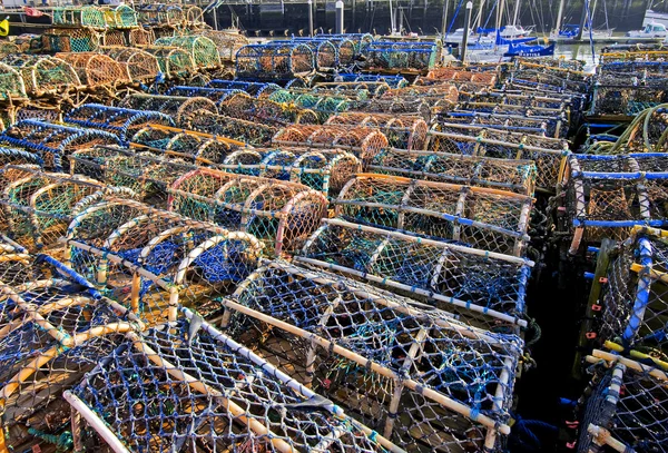 Lobster pots on a quayside — Stock Photo, Image