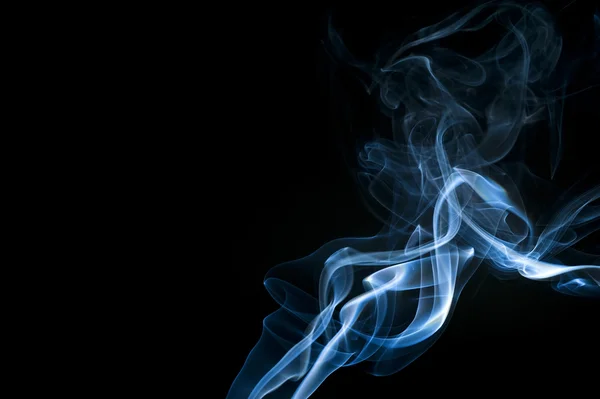 Blaue abstrakte Rauchspuren Stockbild