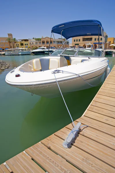Luxury speedboat moored to a jetty — Stock Photo, Image