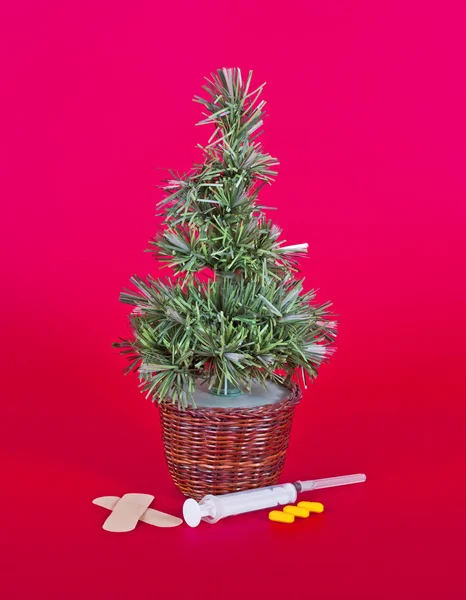 Small christmas tree with medical equipment — Stock Photo, Image