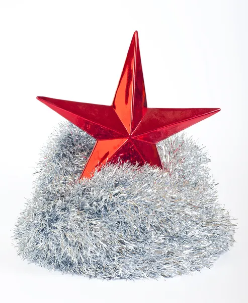 Christmas star and silver tinsel on white — Stock Photo, Image