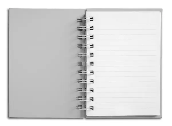 Ноутбук вертикальной белой страницы — стоковое фото