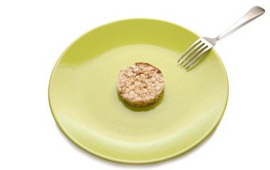 Green plate with cereal dietary pastry and fork clipart