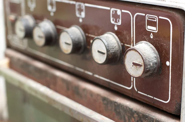 stock image Switches of old rusty gas cooker