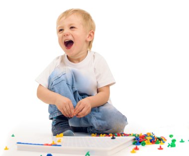 Boy playing and laughing clipart