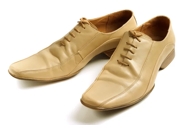 Stock image Mans beige shoes