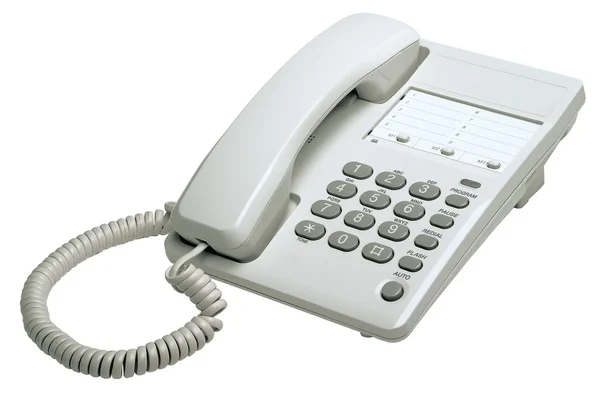 Белый телефон в офисе — стоковое фото