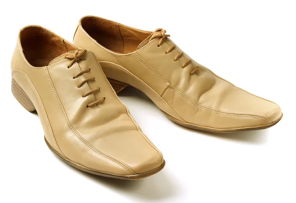 Stock image Mans beige shoes