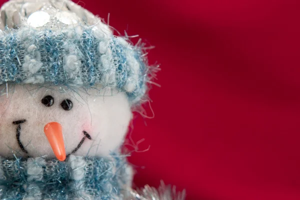 Tarjeta de Navidad con un muñeco de nieve —  Fotos de Stock