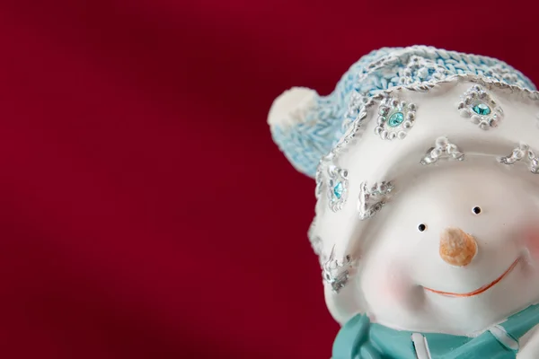Tarjeta de Navidad con un muñeco de nieve — Foto de Stock