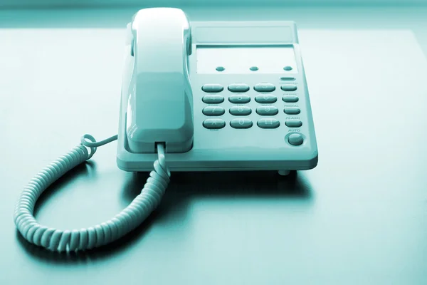 Telefon på ett bord — Stockfoto