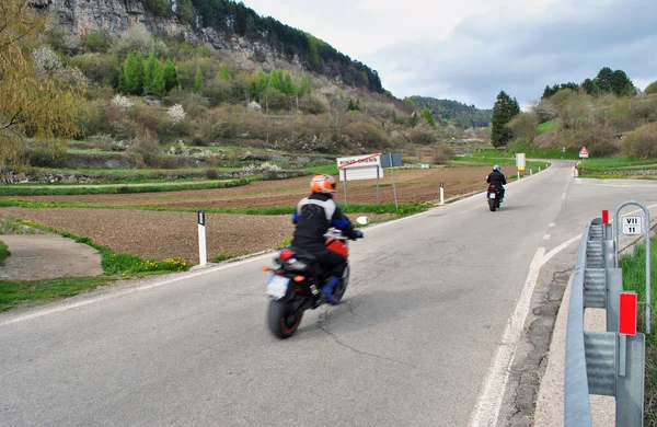 Motorcyclists in the forest — Stock Photo, Image