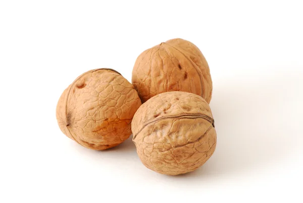 stock image Three walnuts isolated on white background