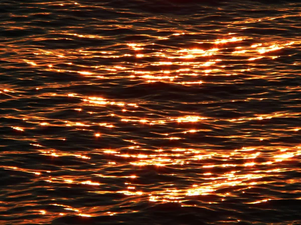 Coucher de soleil dans la mer Photos De Stock Libres De Droits