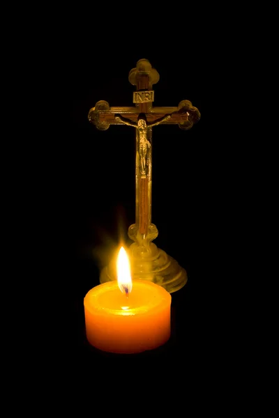 Kreuz und Kerze — Stockfoto