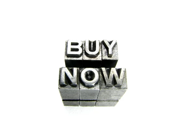 Buy now in vintage letterpress blocks — Stock Photo, Image