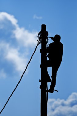 Man working on the pole clipart