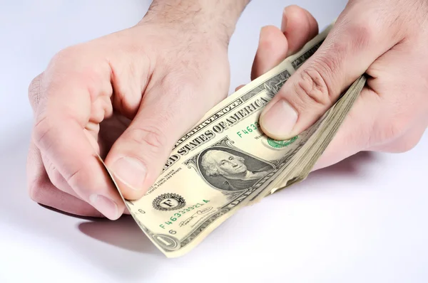 Dólares nas mãos — Fotografia de Stock