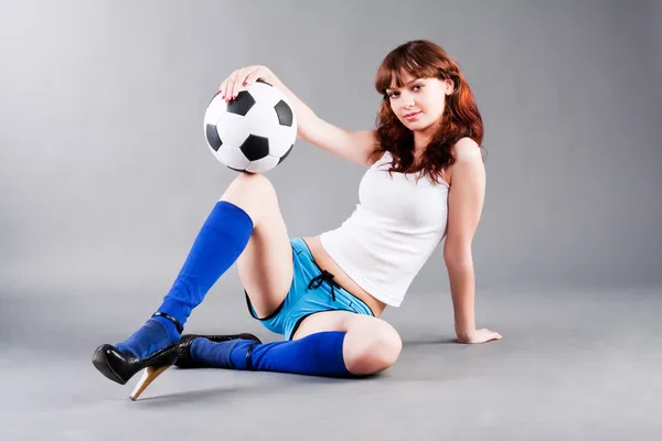 stock image Young sitted girl and soccer ball