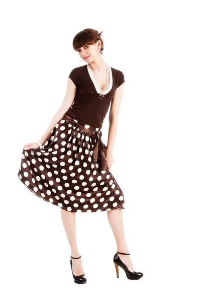Lief meisje in een polka dot jurk — Stockfoto