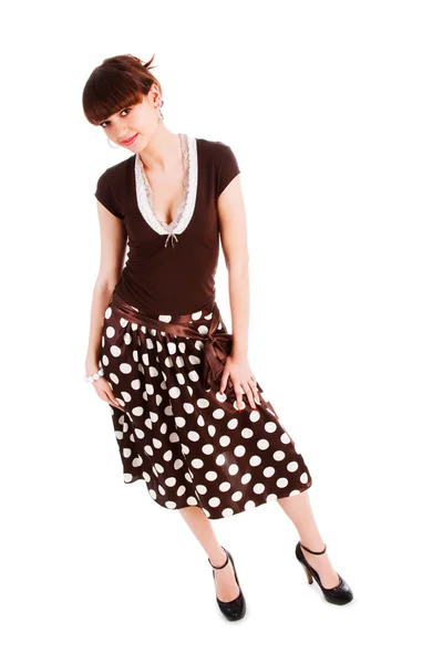 Young beautiful girl in spotted skirt — Stock Photo, Image