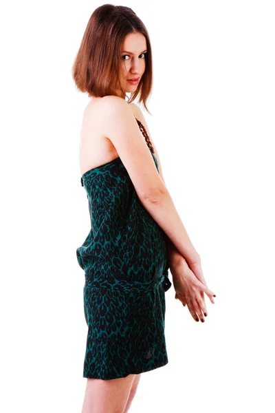Schönes junges Mädchen in grünem Kleid — Stockfoto