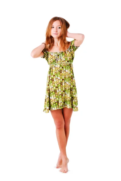 Yeşil elbiseli çekici gülümseme kız — Stok fotoğraf