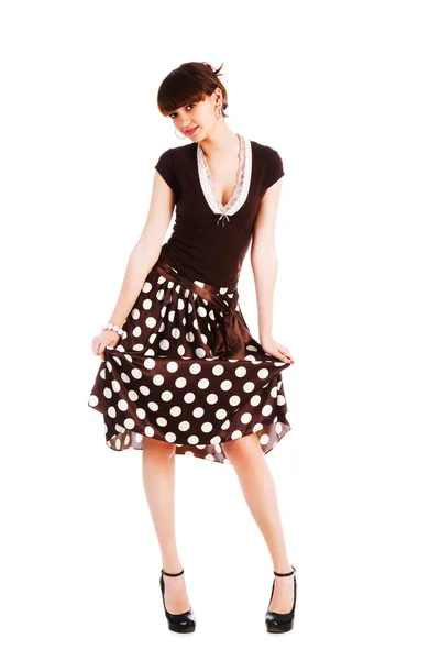 Young sensuality girl in spotted skirt — Stockfoto