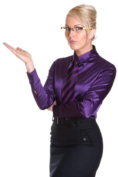 A young beautiful business woman pointing at copyspace — Stock Photo, Image