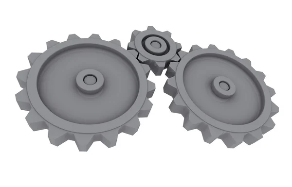 Due grandi e uno piccolo ingranaggi metallici grigi posizionati orizzontalmente su schienale bianco — Foto Stock