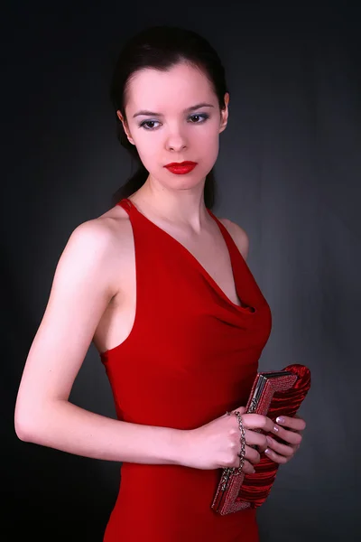 Lady in red witn handbag — Stock Photo, Image