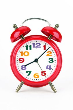 Alarm clock of red colour clipart