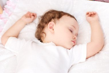 Sweet baby sleeping closeup clipart