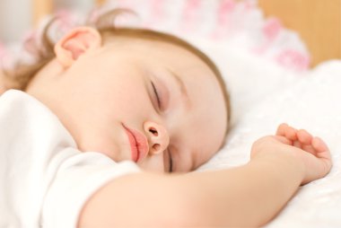 Sweet baby sleeping closeup clipart