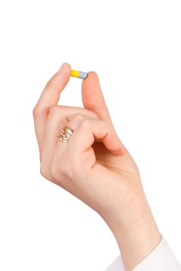 Doğum kontrol hapı, beyaz zemin üzerine izole tutmak el