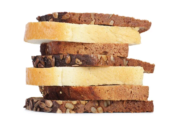 Plastry trzech rodzajów chleba z bliska — Zdjęcie stockowe