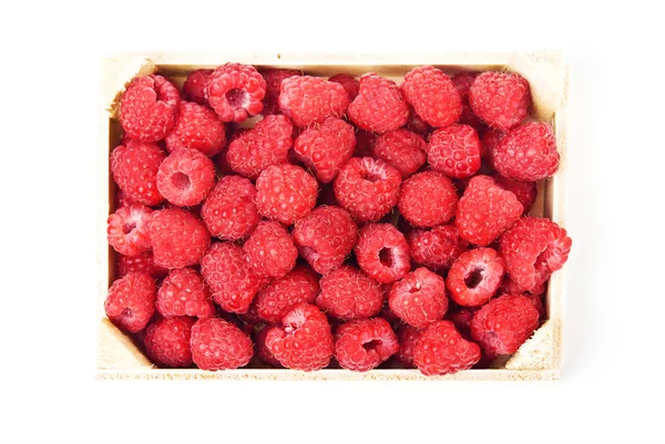 Fresh raspberries in a wooden box — Stock Photo, Image
