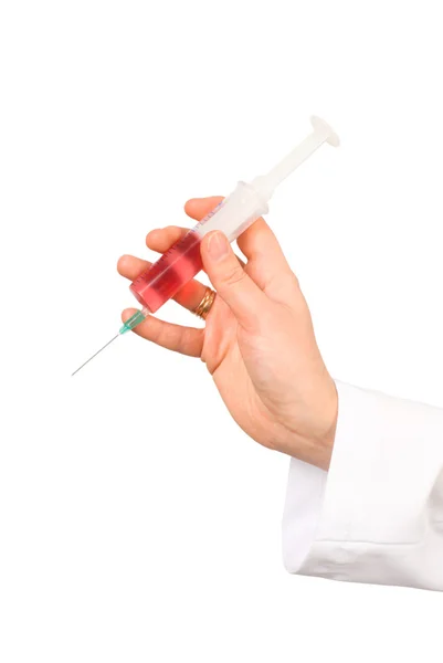 Hand keeping the syringe — Stock Photo, Image