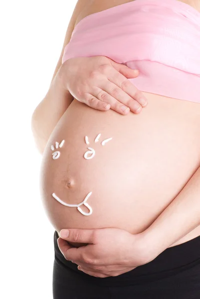 Смешной живот беременной женщины — стоковое фото