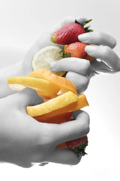 Fruits in hands — Stock Photo, Image