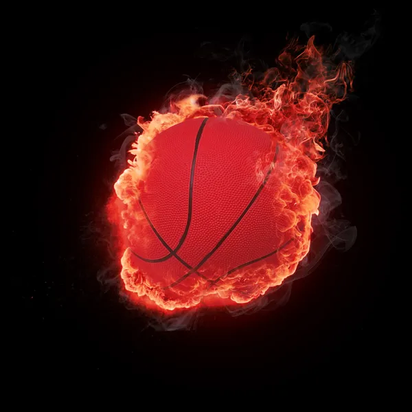 Flying basketball in flames — Stock Photo, Image