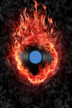 Burning vinyl record isolated over black background