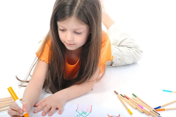 Dziewczynka długowłosy rysuje dom. — Zdjęcie stockowe