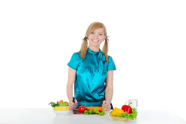 Beautiful young girl preparing a salad — Stock Photo, Image