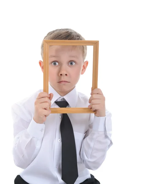 Little boy with a frame in his hands. — Stock Photo, Image