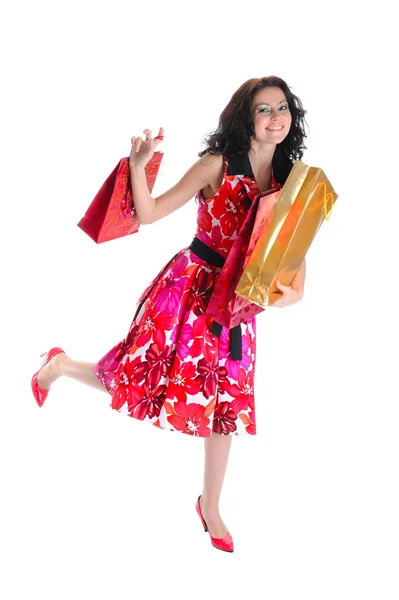 Glada långhåriga ung flicka med väskor — Stockfoto