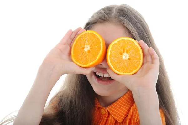 Fille tient des oranges — Photo