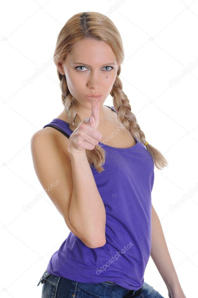 Beautiful girl with pigtails makes a gesture