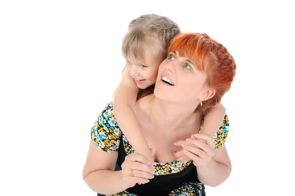 Glückliches Mädchen umarmt ihre Mutter — Stockfoto